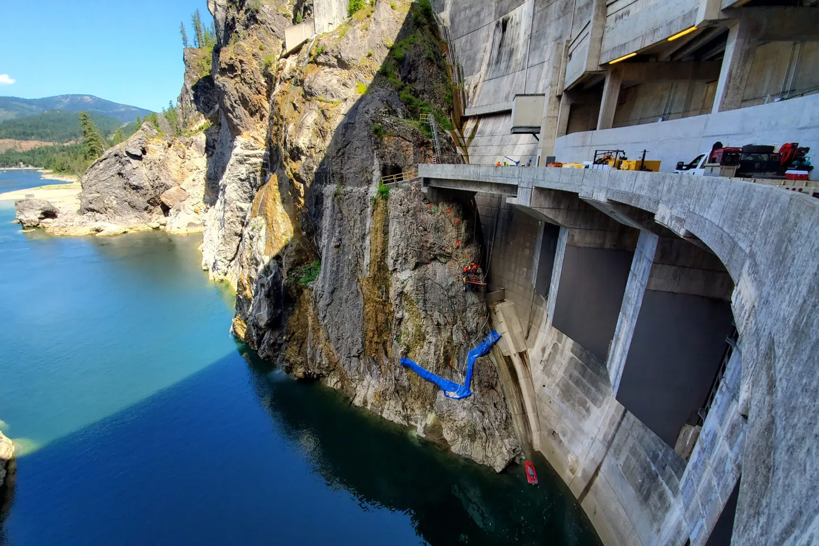Suspended cliff face drilling on abutment, Boundary Dam, Metaline, Washington