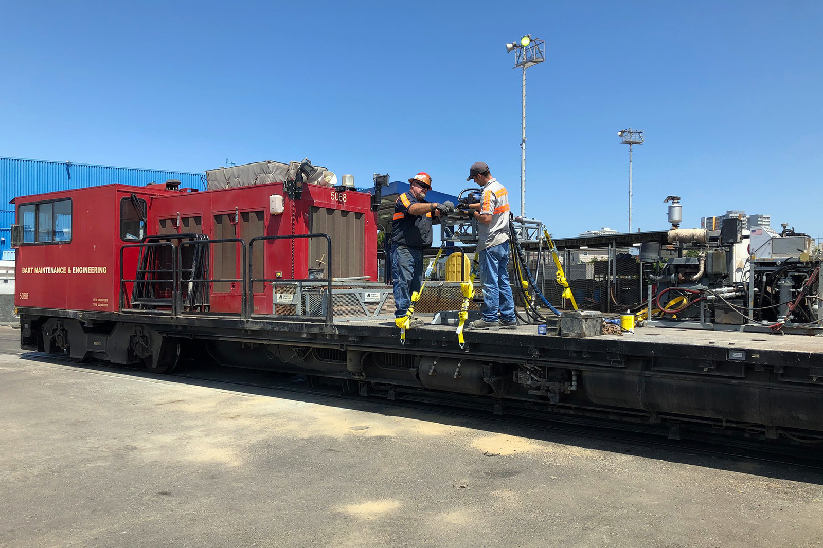 Loading drilling equipment onto railcar, BART Caldecott rail tunnel, Oakland, California